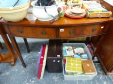 A REGENCY STYLE BOW FRONT SIDE TABLE.