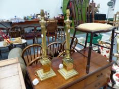 A PAIR OF BRASS TABLE LAMPS.