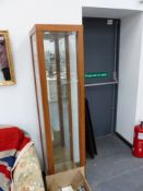 A DISPLAY CABINET.