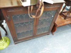 A SMALL OAK GLAZED BOOKCASE AND TWO COFFEE TABLES