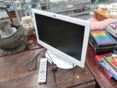 A PORTABLE TV WITH INBUILT DVD PLAYER.