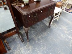 A MAHOGANY CUTLERY TABLE.