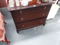 A STAG CHEST OF DRAWERS.