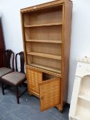 A SATINBIRCH DISPLAY BOOKCASE.