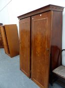 A VICTORIAN MAHOGANY WARDROBE.