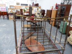 A BRASS AND IRON DOUBLE BED.