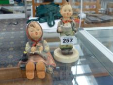 TWO HUMMEL FIGURINES.