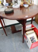 A SMALL MAHOGANY DROP LEAF TABLE.