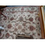 TWO LARGE RUGS.