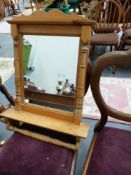 A VINTAGE STOOL AND A MIRROR.