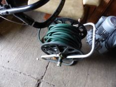 A HOSE REEL.