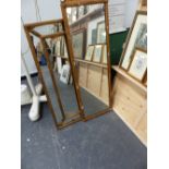 TWO GILT FRAMED MIRRORS.