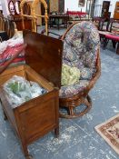 A SEWING BOX AND A RATTAN ROCKING CHAIR.