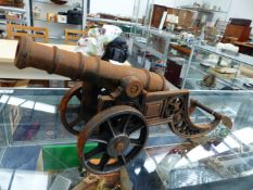 A CAST IRON MODEL CANNON.