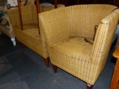 A SMALL RATTAN SETTEE AND MATCHING ARMCHAIR.