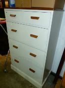 A MODERN PAINTED CHEST OF DRAWERS.