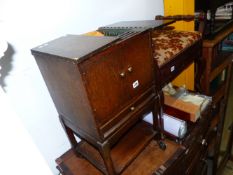 A SEWING CABINET.