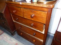 A VICTORIAN MAHOGANY CHEST OF DRAWERS.