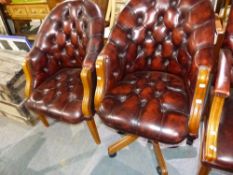 A LEATHER SWIVEL OFFICE ARMCHAIR AND A SIMILAR SQUARE LEG ARMCHAIR.