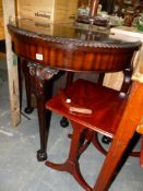 A MAHOGANY FOLD OVER CARD TABLE AND A G-PLAN NEST OF TABLES.