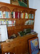 A LARGE VICTORIAN STYLE PINE DRESSER WITH PLATE RACK.