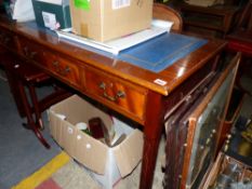 A MAHOGANY WRITING TABLE.