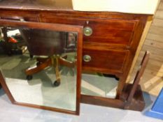 AN EDWARDIAN DRESSING CHEST AND AN EDWARDIAN TWIN PEDESTAL DESK.