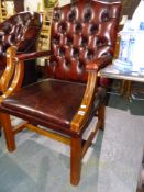 A LEATHER OFFICE ARMCHAIR.