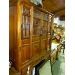 A LARGE ORIENTAL PINE HALL CABINET.