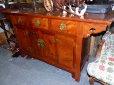 AN ORIENTAL STYLE BURRWOOD AND ROSEWOOD SIDE CABINET.