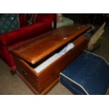 A LATE VICTORIAN PINE BLANKET BOX.