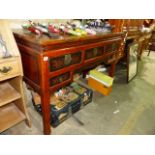 AN ORIENTAL HARDWOOD ALTAR TABLE WITH FIVE DRAWERS.