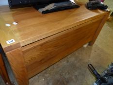 A MODERN OAK BLANKET BOX.