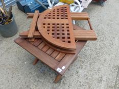 TWO SIMILAR TEAK FOLDING TABLES.