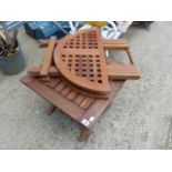 TWO SIMILAR TEAK FOLDING TABLES.