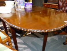 A MAHOGANY DROP LEAF DINING TABLE.