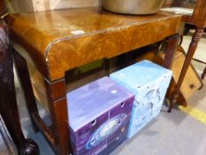 A WALNUT SIDE TABLE.