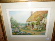 A.DAVIS (19th/20th.C SCHOOL) A COUNTRY COTTAGE WITH CHILDREN, SIGNED WATERCOLOUR. 27 x 36cms.