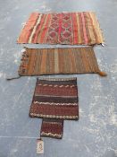 TWO TRIBAL BELOUCH SADDLE BAGS AND A CAUCASIAN FLATWEAVE PANEL.