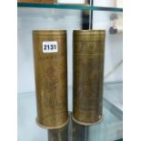 TWO TRENCH ART BRASS SHELL CASES.