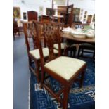 A SET OF SIX GOOD GEORGIAN MAHOGANY DINING CHAIRS WITH SHAPED CREST RAILS ABOVE PIERCED SPLATS.
