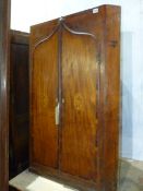 A GEO.III.MAHOGANY AND INLAID CABINET WITH TWIN DECORATIVE ARCH DOORS. H.104cms.