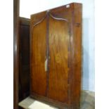 A GEO.III.MAHOGANY AND INLAID CABINET WITH TWIN DECORATIVE ARCH DOORS. H.104cms.