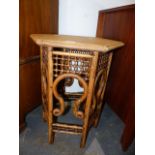AN ARTS AND CRAFTS MOORISH STYLE OCTAGONAL OCCASIONAL TABLE. H.54cms.