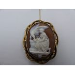 A VICTORIAN LARGE CARVED CAMEO DEPICTING HEBE FEEDING THE EAGLE OF ZEUS, MOUNTED IN A PRECIOUS