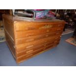 AN OAK SIX DRAWER PLAN CHEST IN TWO SECTIONS. 145x89cms.