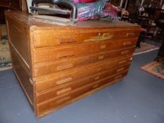 AN OAK SIX DRAWER PLAN CHEST IN TWO SECTIONS. 145x89cms.