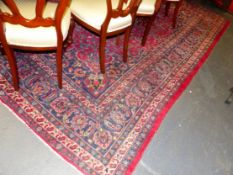 A PERSIAN CARPET OF CLASSIC DESIGN 332 X 308 CM