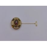 A PRECIOUS YELLOW METAL, TESTED AS 18ct OR HIGHER, ENAMELLED AND PEARL VICTORIAN ETRUSCAN BROOCH. AT
