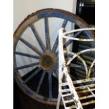 TWO VINTAGE WOODEN CART WHEELS.